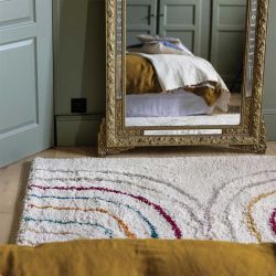 Tapis beige et arc en ciel